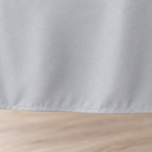 Silver tablecloth, fabric and hem closeup