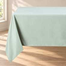 Green rectangle tablecloth, fabric and hem detail