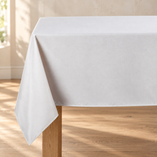 Neutral rectangle tablecloth, fabric and hem detail